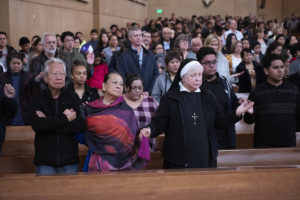 World Youth Day pilgrims from across the Archdiocese of Los Angeles receive a special blessing from Archbishop José H. Gomez during a Mass on Sunday, January 13, 2019 at the Cathedral of Our Lady of the Angels in preparation for the event in Panama with Pope Francis Jan. 22-27. VICTOR ALEMÁN/ANGELUS NEWS