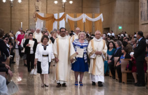 On Saturday, June 8, Archbishop José H. Gomez ordained 11 new permanent deacons for the Archdiocese of Los Angeles. With friends and family at the Cathedral of Our Lady of the Angels he welcomed Nestor and Winnie Aclan, Alex and Carmen Aguilar, Jesús and Erica Bravo, Ray and Connie Gallego, Jorge and Lucy Madrigal, Chuck and Linda McDaniels, George and Tricia Mora, Mark and Louise Ramirez, Mike and Mary Rutz, Rubén and Janet Sainz, Denise and Reed Wilcox. VICTOR ALEMÁN/ANGELUS NEWS