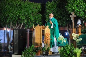 Fr. Jesus Herrera Garcia leads outdoor Adoration Saturday, Sept. 12 at Santa Isabel Catholic Church in East LA. (David Amador Rivera)