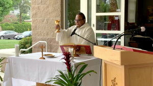Father Vivian Ben Lima celebrated daily Mass July 23 outside St. Mel Church in Woodland Hills. (Image via Facebook)