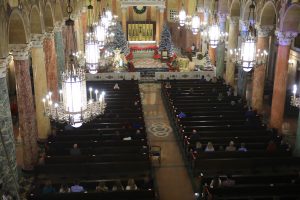 Father Marcos Gonzalez celebrates the 9:30 a.m. Christmas Mass at St. Andrew Church in Pasadena. (David Amador Rivera)
