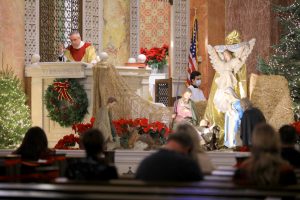 Father Marcos Gonzalez celebrates the 9:30 a.m. Christmas Mass at St. Andrew Church in Pasadena Dec. 25, 2020. (David Amador Rivera)