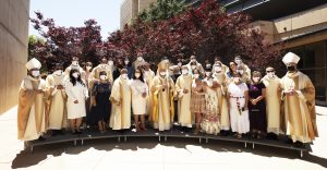 The deacons are pictured with their wives following the June 12 ordination. (Victor Alemán)