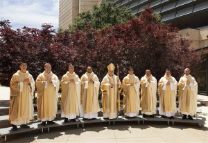 Left to right: Father Francis Kim, Father Andrew Hedstrom, Father Michael Masteller, Father Cesar Guardado, Archbishop José H. Gomez, Father Jihoon Kim, Father Sergio Hidalgo, Father Patrick Ayala, and Father Matthew Miguel. (Victor Alemán)