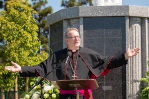 Bishop Robert Barron speaks at the dedication of the new priest burial area at Santa Clara Cemetery in Oxnard, California, in August 2021. (JohnMichael Filippone)