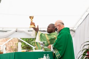 Father Chidi Ekpendu celebrates Mass at Christ the King Church for the first World Day for Grandparents and the Elderly. (JohnMichael Filippone)