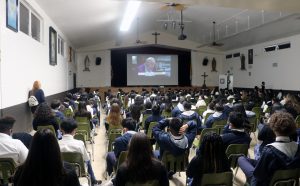 After Mass at St. Anthony of Padua school, students gathered to watch the livestream of the consecration at St. Peter’s Basilica. (Pablo Kay)