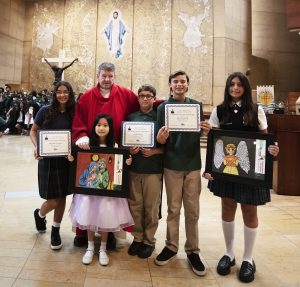 Msgr. Terrance Fleming poses with LA Catholic school students honored at the annual Missionary Childhood Association (MCA) Mass Oct. 19. Third-grader Violet Hsu from All Souls World Language School in Alhambra (second from left) and sixth-grader Liliana Espinoza from St. Gregory the Great in Whittier (far right) were national finalists for this year’s MCA Christmas Artwork Contest. The other three students received $500 scholarships from the Lay Mission-Helpers Association as winners of an essay contest about the importance of mission. From left to right: Angelina Escudero (seventh grade, St. James, Torrance), Jason Cheung (sixth grade, Our Lady of the Assumption, Ventura) and Gavin Scarlett (eighth grade, Our Lady of the Assumption, Ventura). (Victor Alemán)