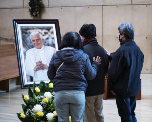 Visitors pay their respects to the late Pope Benedict XVI after a Jan. 5 memorial Mass at the Cathedral of Our Lady of the Angels. (Victor Alemán/Angelus News)