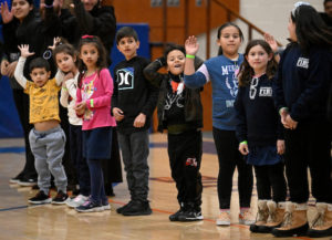 Young spectators cheer on Team Priests and Team Seminarians at the annual vocations basketball game Feb. 17, 2023. (John McCoy)