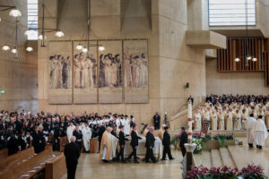 The casket of Bishop David O'Connell is brought into the Cathedral of Our Lady of the Angels for his funeral Mass Friday, March 3, 2023. (Jay L. Clendenin / LA Times)