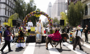 Archbishop José H. Gomez sprinkles holy water on a horse at Olvera Street in downtown LA for the annual “Blessing of the Animals” on Holy Saturday. (Victor Alemán)