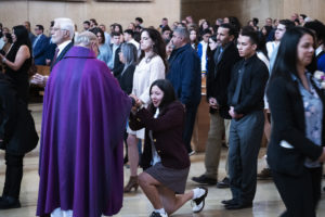 Archbishop Jóse H. Gomez offers communion during the 49th annual Christian Service Awards Mass at the Cathedral of Our Lady of the Angels March 25. (Victor Alemán)