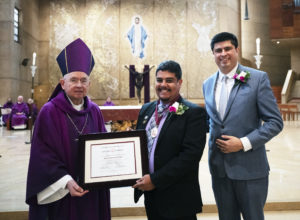 Alexis Creano poses with Archbishop Jóse H. Gomez and LA Catholic Schools superintendent Paul Escala after being honored at the annual Christian Service Awards Mass at the Cathedral of Our Lady of the Angels March 25. A total of 69 Catholic high school students and 10 teachers were honored at the Mass for their “outstanding commitment to Christian service in the community.” (Victor Alemán)