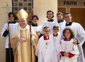 Archbishop José H. Gomez poses with acolytes and altar servers at a bilingual Mass in English and Croatian at St. Anthony Croatian Church on April 16. (Victor Alemán)