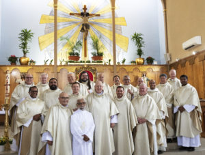 Msgr. John Moretta, pastor of Resurrection Church in Boyle Heights, poses with his concelebrants following a special Mass on April 30 celebrating 55 years since his ordination to the priesthood and 40 years at Resurrection. (Victor Alemán)