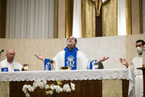 Fr. Ron Clark, center, Msgr. Norman Priebe, left, and Fr. Daniel Vega preside over the May Crowning Mass on May 5 at St. Dorothy in Glendora. (Victor Alemán)