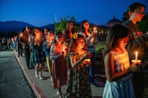 The faithful walk with candles during the Carmelite Sisters of the Most Sacred Heart of Los Angeles' special Mass and candlelight procession in response to the Dodgers' decision to honor the Sisters of Perpetual Indulgence on Friday, June 16. (John Rueda/ADLA)