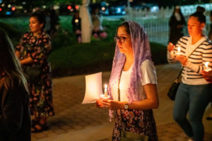 The faithful walk with candles during the Carmelite Sisters of the Most Sacred Heart of Los Angeles' special Mass and candlelight procession in response to the Dodgers' decision to honor the Sisters of Perpetual Indulgence on Friday, June 16. (John Rueda/ADLA)