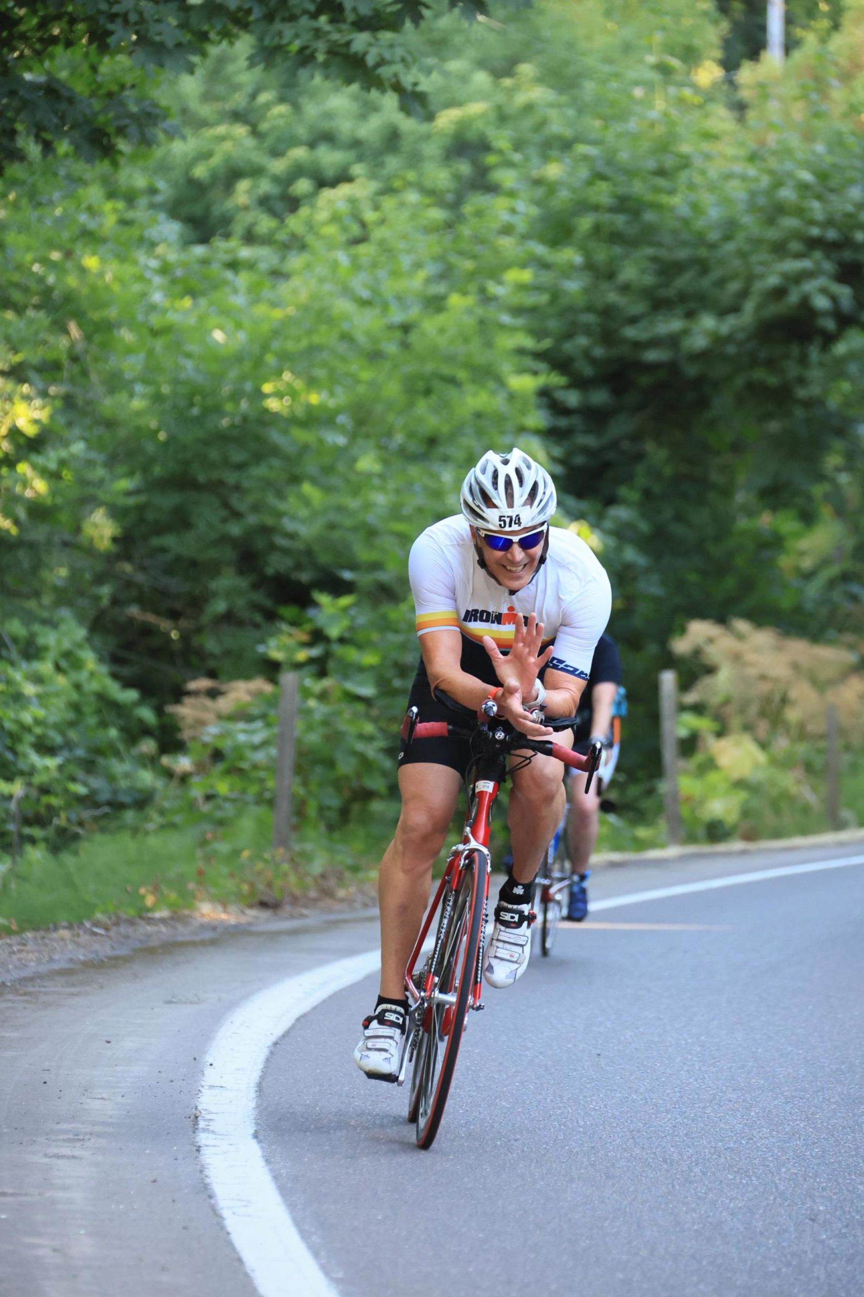 Father Tom Baker is still doing triathlons at age 64