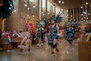 Cultural dancers process in during the “One Mother, Many Peoples” Mass at the Cathedral of Our Lady of the Angels on Aug. 26. (John Rueda/ADLA)