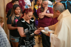 Parishioners receive holy Communion during the “One Mother, Many Peoples” Mass at the Cathedral of Our Lady of the Angels on Aug. 26. The special Mass and rosary service celebrated the rich diversity found within the Archdiocese of Los Angeles. (John Rueda/ADLA)
