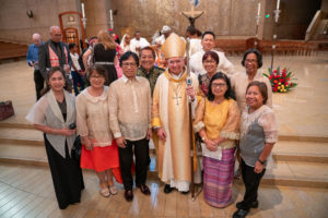 LA Archbishop José H. Gomez poses with parishioners following the special “One Mother, Many Peoples” Mass at the Cathedral of Our Lady of the Angels on Aug. 26. (John Rueda/ADLA)