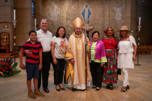 LA Archbishop José H. Gomez poses with parishioners following the special “One Mother, Many Peoples” Mass at the Cathedral of Our Lady of the Angels on Aug. 26. (John Rueda/ADLA)