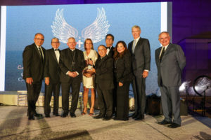 Members of Catholic Community Foundation of Los Angeles pose with Los Angeles Archbishop José H. Gomez and Bishop-elect Brian Nunes after receiving the Business Award during Catholic Association for Latino Leadership (CALL)’s 11th Annual Angel Awards at the Cathedral of Our Lady of the Angels on Sept. 9. (Guillermo A. Luna)