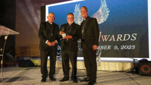 Bishop Jaime Soto, center, of the Diocese of Sacramento, stands with Los Angeles Archbishop José H. Gomez and Auxiliary Bishop Marc V. Trudeau as Soto was honored during Catholic Association for Latino Leadership (CALL)’s 11th Annual Angel Awards at the Cathedral of Our Lady of the Angels on Sept. 9. (Guillermo A. Luna)