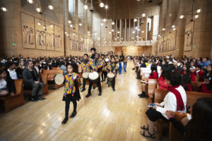 Students from the music program at Transfiguration Catholic School in Los Angeles process into the Cathedral of Our Lady of the Angels on Oct. 17 at the start of the annual Missionary Childhood Association Youth Mass. More than 1,700 students from 36 Catholic schools in the region attended. (Victor Alemán)
