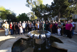 Celebrants, along with Los Angeles Auxiliary Bishop Brian Nunes, pose during  a dedication for a new Native garden space and fountain at Mission San Gabriel Arcángel on Nov. 19. (Victor Alemán)