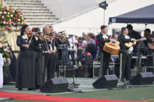 Mariachis play during the 92nd Procession and Mass honoring Our Lady of Guadalupe and St. Juan Diego at East LA College Stadium on Dec. 3. (Sarah Yaklic)
