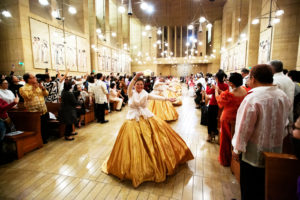 Dancers process in before the annual Simbang Gabi kickoff Mass Dec. 15 at the Cathedral of Our Lady of the Angels. (Victor Alemán)
