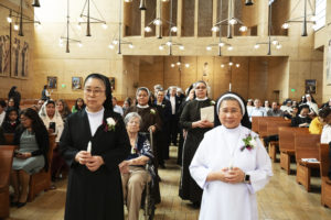 Several local women religious who are celebrating jubilee anniversaries this year process in at the beginning of the annual Jubilarian Mass on Jan. 28 at the Cathedral of Our Lady of the Angels. (Victor Alemán)