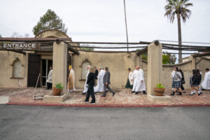Archbishop José H. Gomez and others walk from the Mass to the blessing of the memorial exhibit in honor of the one-year anniversary of Bishop David O'Connell's death. (John Rueda)