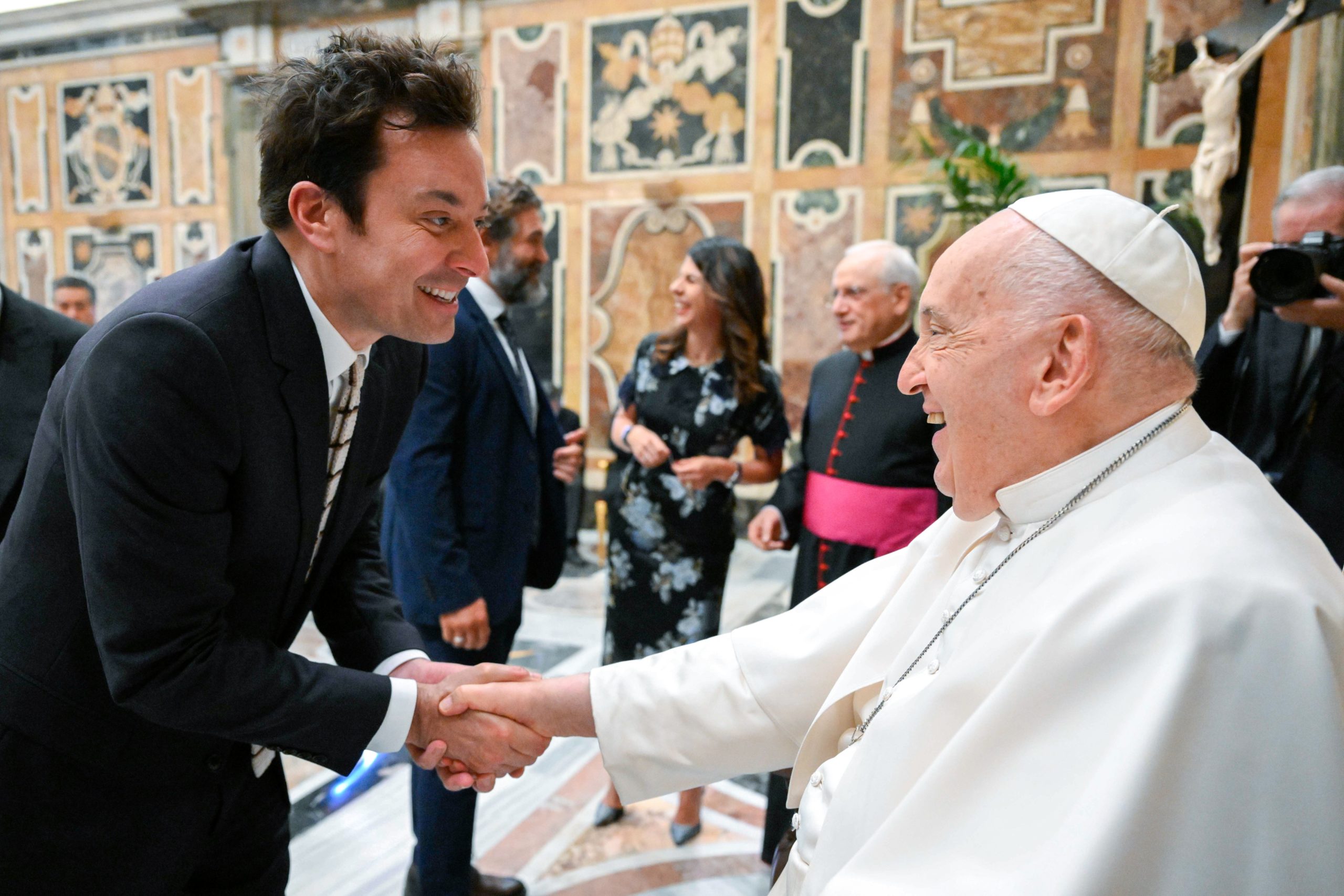 Pope jokes with comedians at Vatican meeting