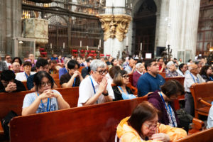 Pilgrims pray during Mass at the Metropolitan Cathedral in Mexico City on July 5. (Victor Alemán)