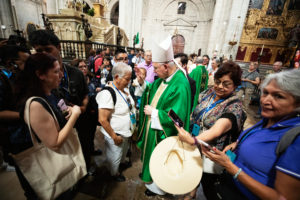 Archbishop José H. Gomez blesses pilgrims following a Mass at the Metropolitan Cathedral in Mexico City on July 5. (Victor Alemán)