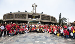 Archbishop José H. Gomez poses with the hundreds of pilgrims from the Archdiocese of Los Angeles outside the Basilica Of Our Lady of Guadalupe on July 6. (Victor Alemán)