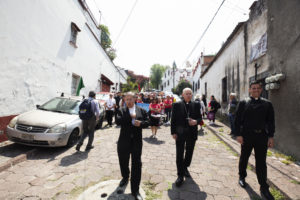 Archbishop José H. Gomez, right, and Msgr. Eduardo Chávez, co-founder of the Institute of Guadalupan Studies in Mexico City, led the procession to the basilica. (Victor Alemán)