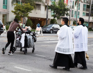 More than 300 priests, seminarians, and lay Catholics joined the archdiocese's Office of Vocations and the Friars and Sisters of the Poor of Jesus Christ LA for a Eucharistic Procession through downtown LA’s Skid Row on Saturday, July 27. (Victor Alemán)