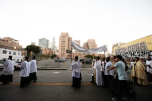 More than 300 priests, seminarians, and lay Catholics joined the archdiocese's Office of Vocations and the Friars and Sisters of the Poor of Jesus Christ LA for a Eucharistic Procession through downtown LA’s Skid Row on Saturday, July 27. (Victor Alemán)