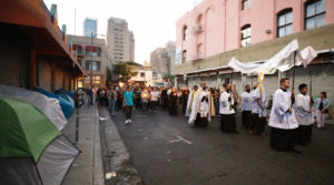 More than 300 priests, seminarians, and lay Catholics joined the archdiocese's Office of Vocations and the Friars and Sisters of the Poor of Jesus Christ LA for a Eucharistic Procession through downtown LA’s Skid Row on Saturday, July 27. (Victor Alemán)