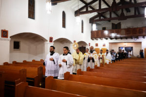 The Eucharistic Procession through downtown LA’s Skid Row returns to St. Francis Xavier Japanese Catholic Center in Los Angeles on Saturday, July 27. (Victor Alemán)