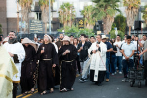 More than 300 priests, seminarians, and lay Catholics joined the archdiocese's Office of Vocations and the Friars and Sisters of the Poor of Jesus Christ LA for a Eucharistic Procession through downtown LA’s Skid Row on Saturday, July 27. (Victor Alemán)