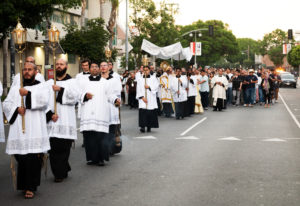 More than 300 priests, seminarians, and lay Catholics joined the archdiocese's Office of Vocations and the Friars and Sisters of the Poor of Jesus Christ LA for a Eucharistic Procession through downtown LA’s Skid Row on Saturday, July 27. (Victor Alemán)