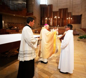 Archbishop José H. Gomez blesses anniversary stoles for deacons celebrating milestones during a special Diaconate Mass at the Cathedral of Our Lady of the Angels on Aug. 10 to celebrate the feast day of St. Lawrence, the notable third-century deacon and martyr. (Victor Alemán)