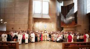 Deacons, their wives and loved ones pose following a special Diaconate Mass at the Cathedral of Our Lady of the Angels on Aug. 10 to celebrate the feast day of St. Lawrence, the notable third-century deacon and martyr. (Victor Alemán)