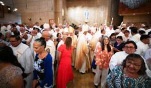 Archbishop José H. Gomez, bishops and priests greet those who attended a special Diaconate Mass at the Cathedral of Our Lady of the Angels on Aug. 10 to celebrate the feast day of St. Lawrence, the notable third-century deacon and martyr. (Victor Alemán)